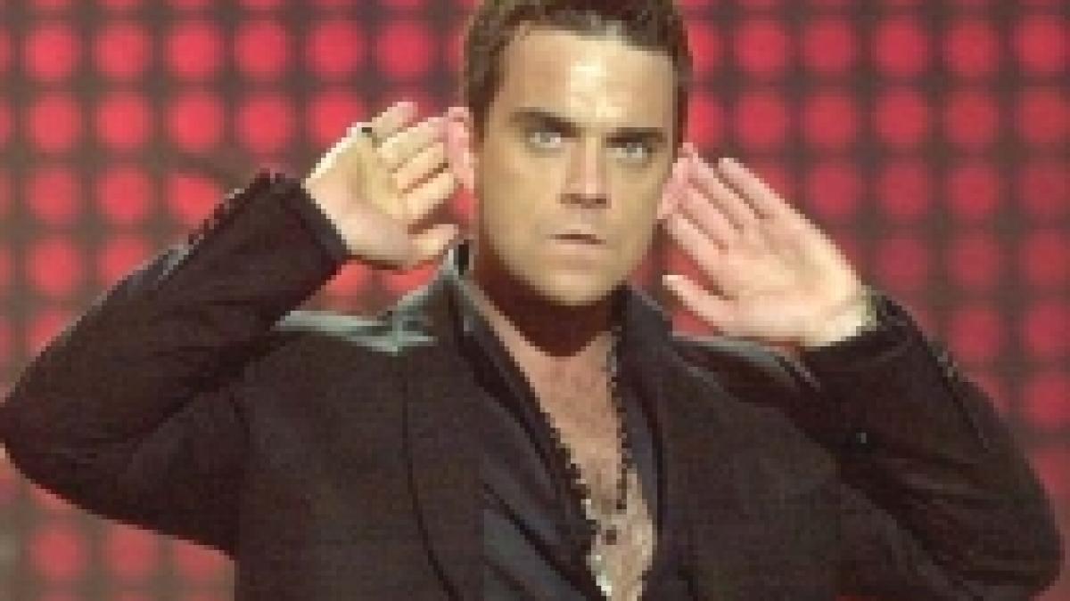 robbie williams canta alaturi de take that dupa 15 ani
