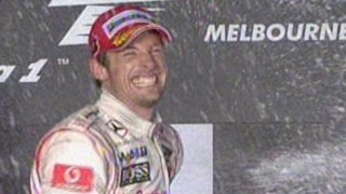 jenson button a castigat mp al australiei dupa o cursa agitata cu multe acrosaje