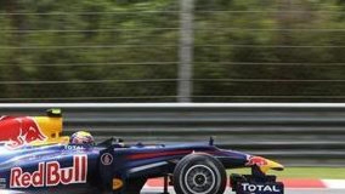 webber stapaneste ploaia in malaysia si obtine al treilea pole position pentru red bull in acest
