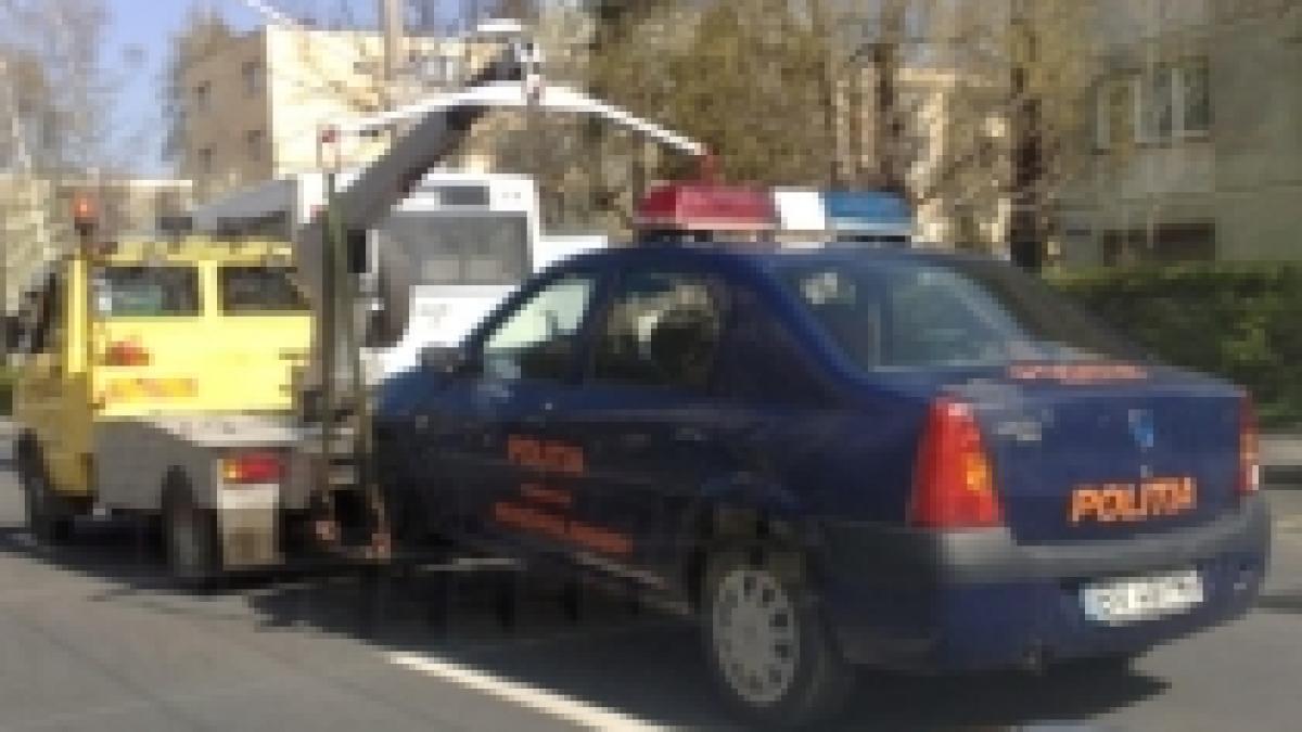 masina a politiei ridicata in brasov foto