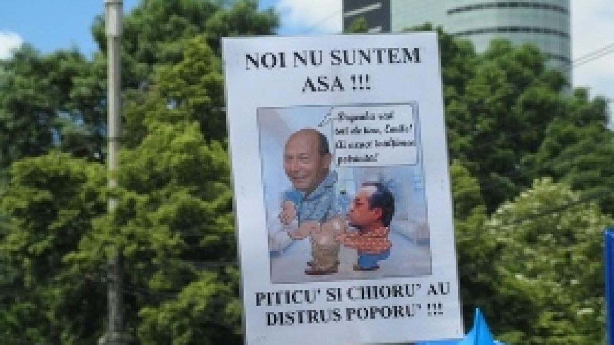 sa muriti bine protestatarii din piata victoriei au scandat impotriva lui boc si basescu