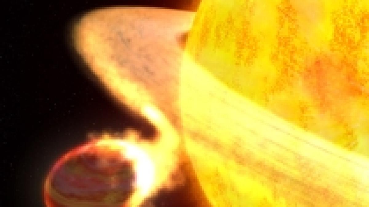 planeta devorata de steaua in jurul careia orbiteaza suprinsa cu ajutorul telescopului hubble foto