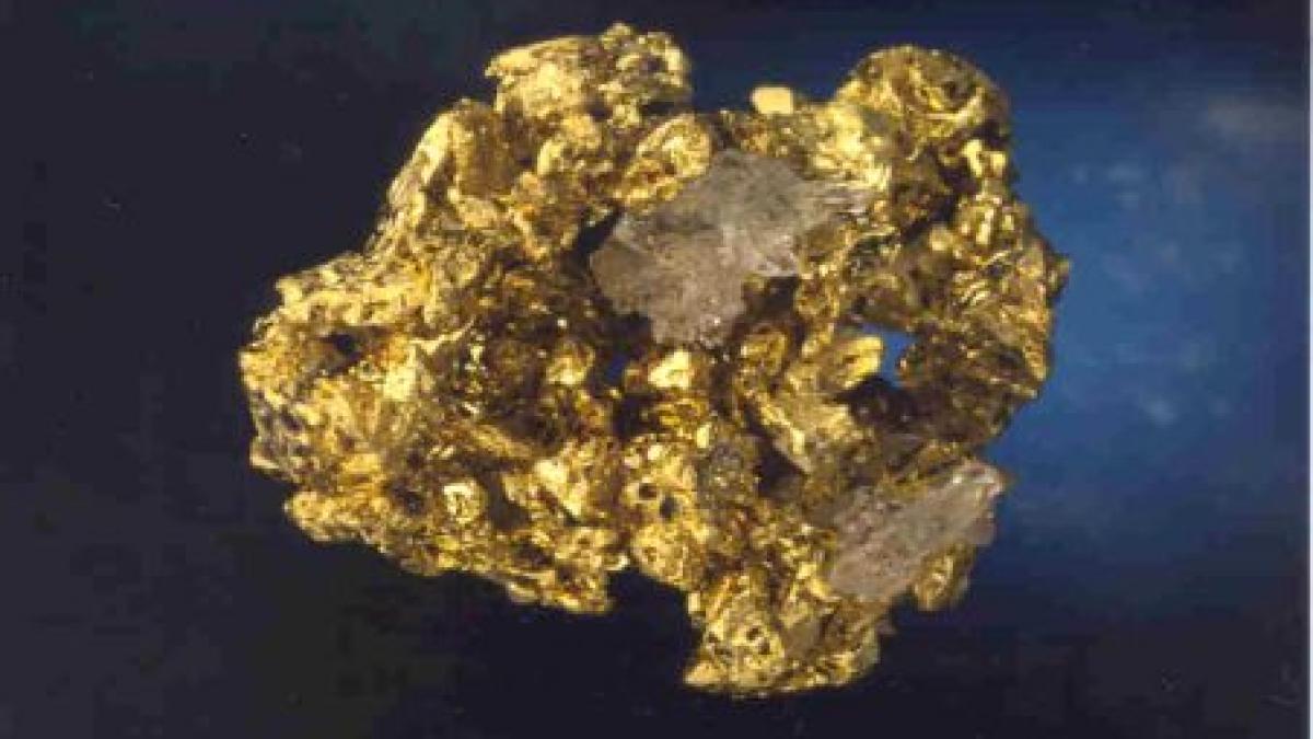 aurul la un nou record de 1 264 9 dolari pe uncie