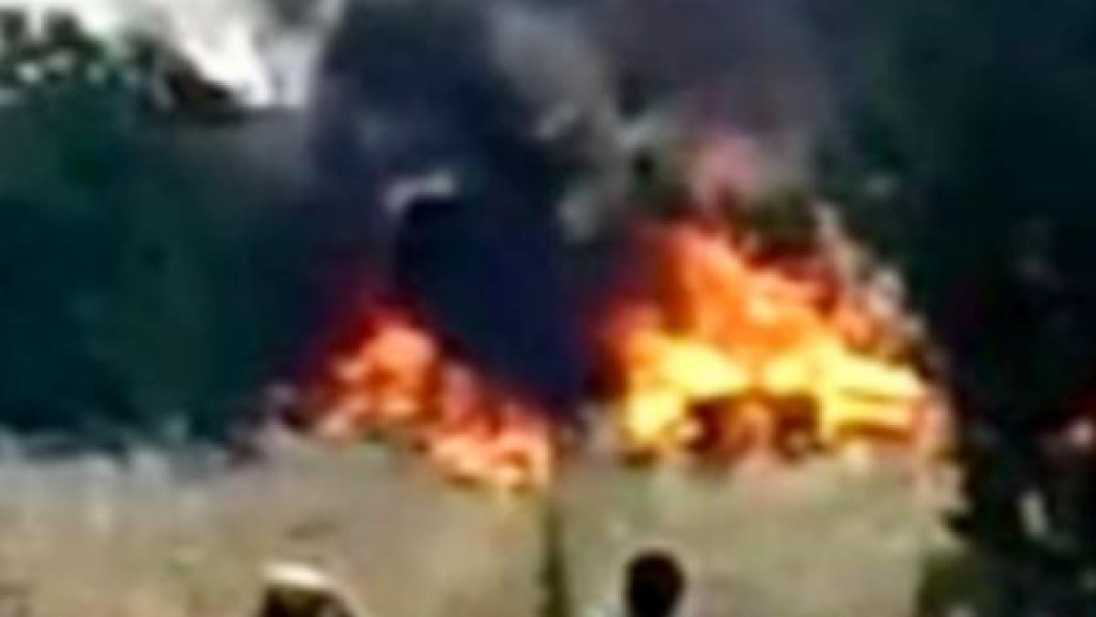 o tabara improvizata in care se aflau romani a ars in spania video