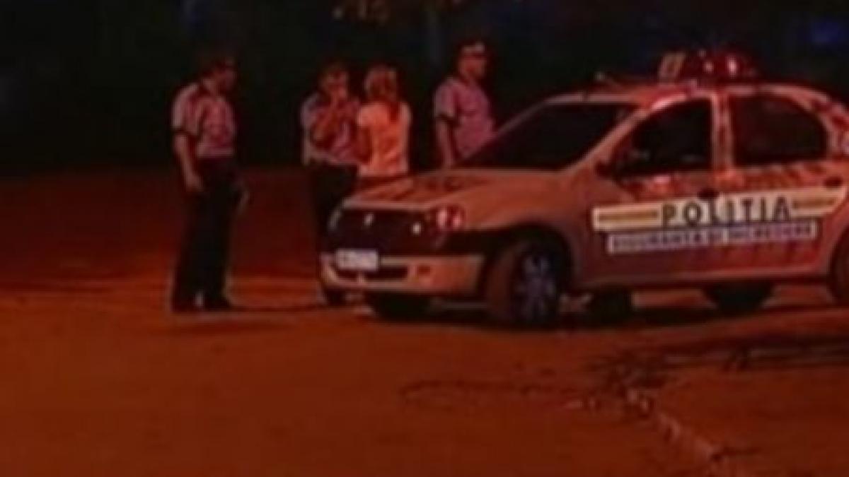 rafuiala cu sabii si pistoale intre o familie de florari si cativa indivizi care cereau taxa de