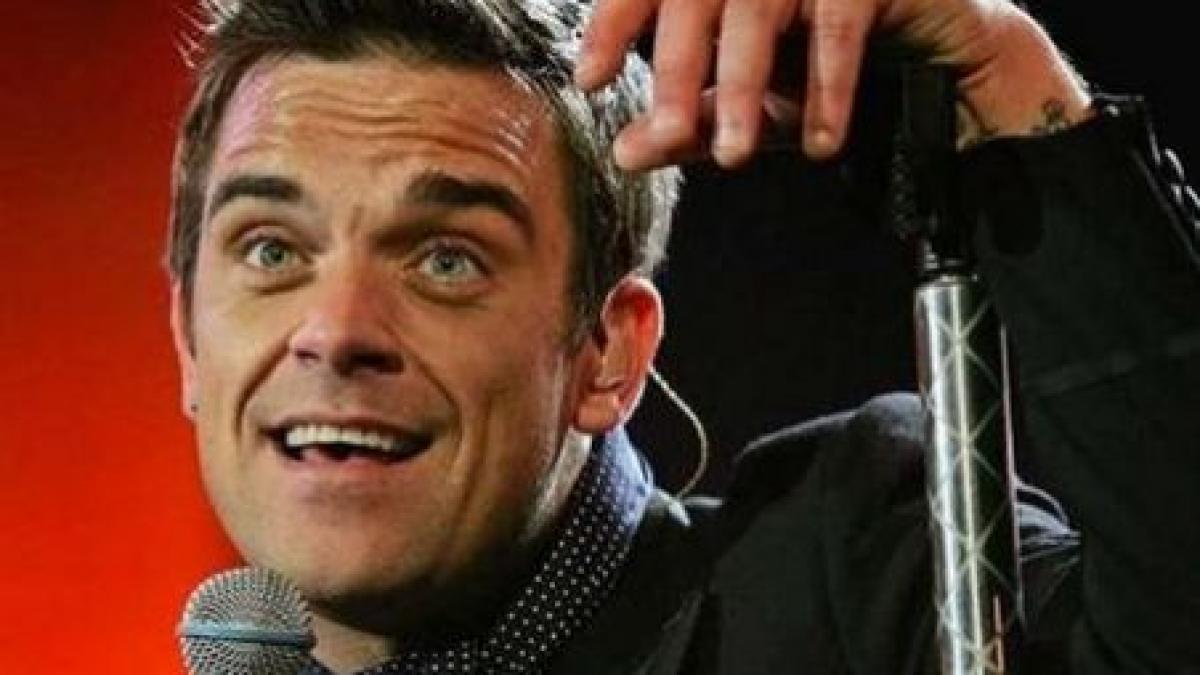 robbie williams a uitat versurile in timpul unui concert video