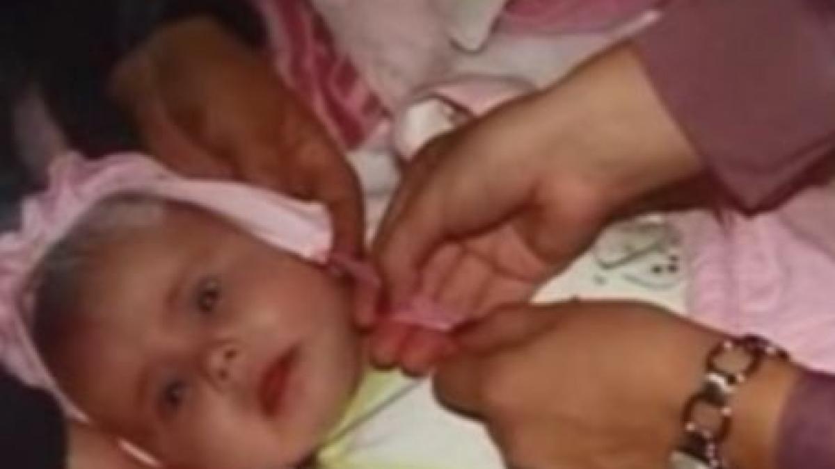 o fetita de patru luni cu tumora pe creier nu are de cine sa fie operata in romania