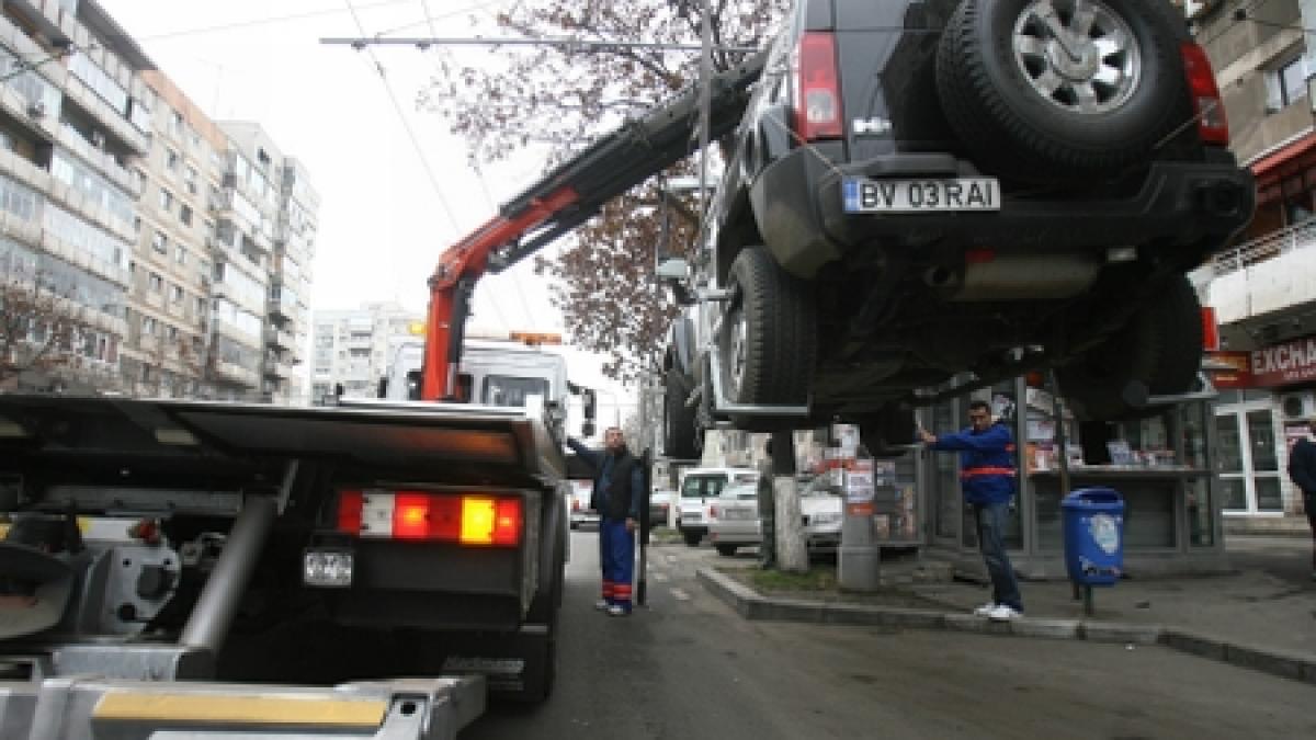 masina parcata neregulamentar ridicata cu tot cu batrana aflata inauntru