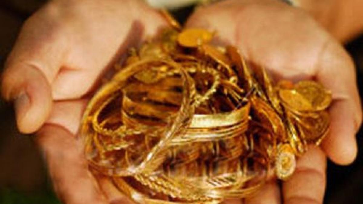 tot mai multi romani isi investesc economiile in aur