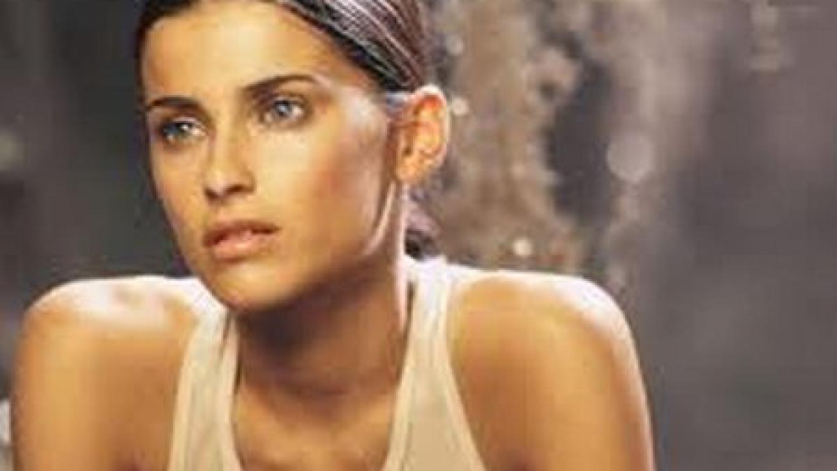 nelly furtado doneaza milionul de dolari primit de la gaddafi