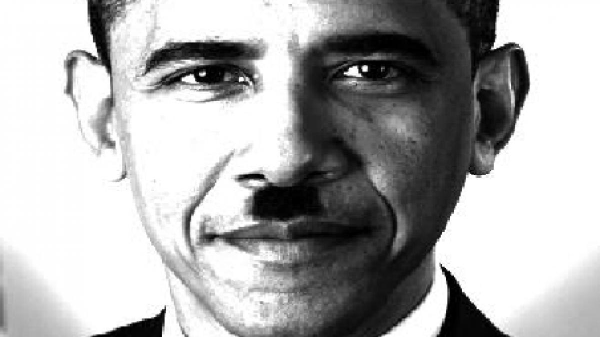 poza cu obama purtand mustata lui hitler atasata pe pancarta unui protestant