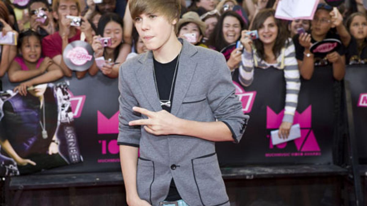 popstarul justin bieber mai popular pe twitter decat presedintele barack obama