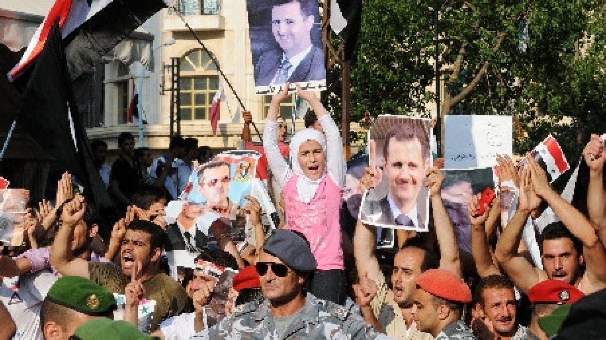 imagini socante fortele armate din siria agreseaza si deschid focul asupra protestatarilor