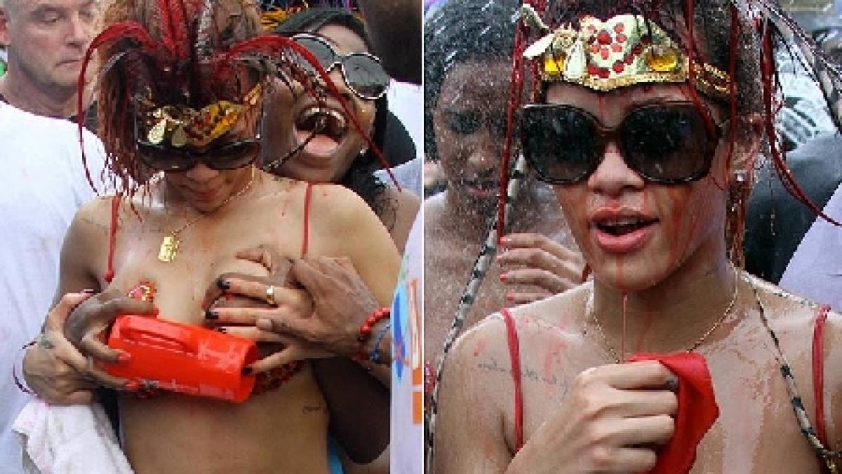 rihanna incinge atmosfera in barbados o admiratoare o apuca de sani pe cantareata