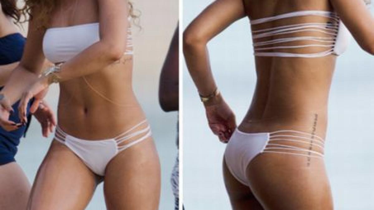 rihanna extrem de sexy intr un costum de baie decupat