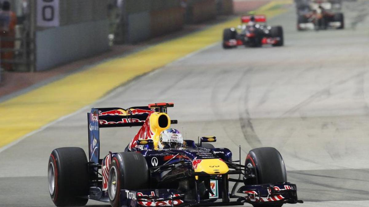 sebastian vettel s a apropiat de titlul mondial dupa ce a castigat marele premiu din singapore