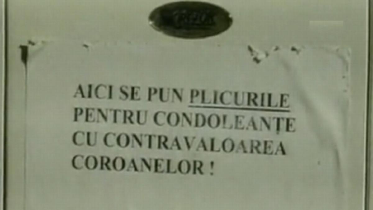 propunerea unui preot plic cu bani in locul coroanei de la inmormantare