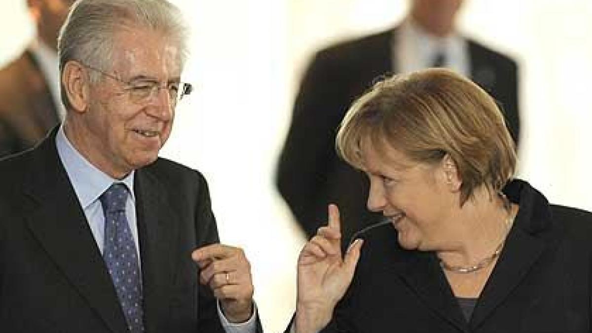 merkel multumita de reformele fiscale italiene munca guvernului din italia este recompensata