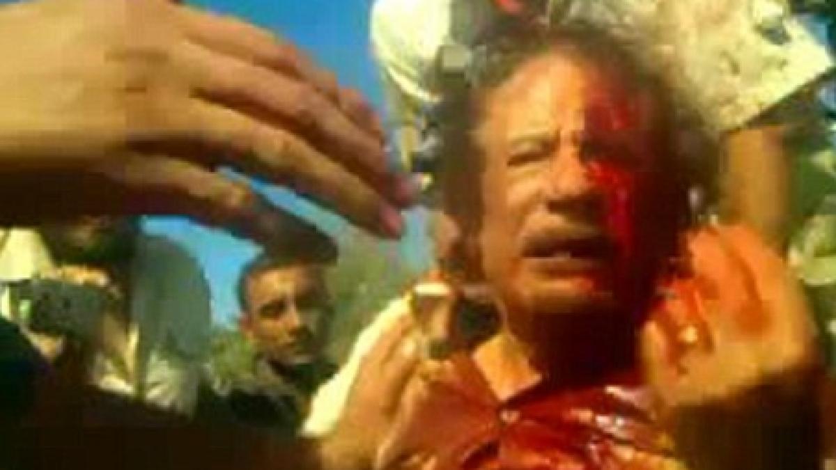 verigheta si camasa lui muammar gaddafi scoase la vanzare pentru 2 milioane de dolari