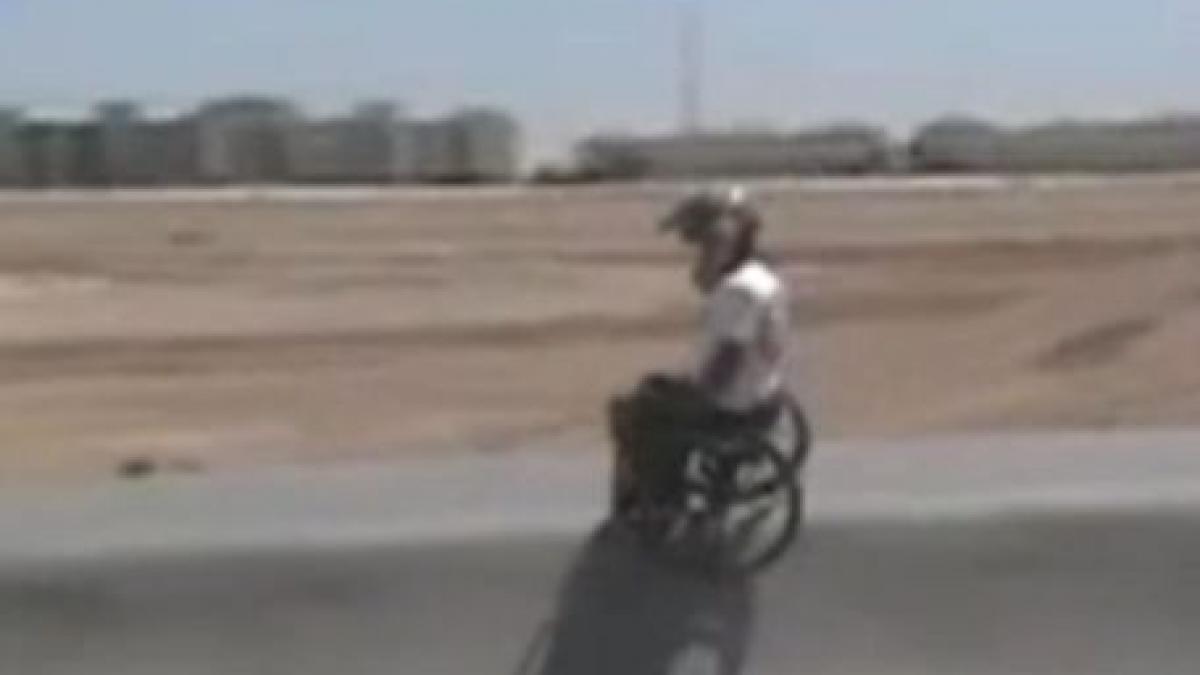 impresionant sport extrem in scaunul cu rotile