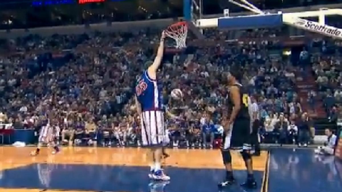 cel mai inalt baschetbalist din lume atinge inelul fara sa sara ce inaltime are micutul sturgess