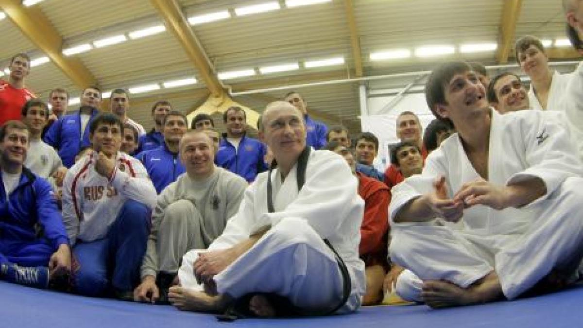 spectator cu greutate vladimir putin in tribune la jo de la londra