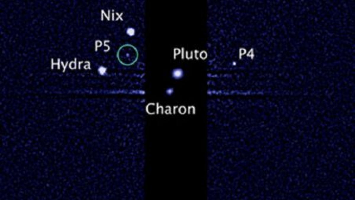 un al cincilea satelit al planetei pluto descoperit cu ajutorul telescopului hubble