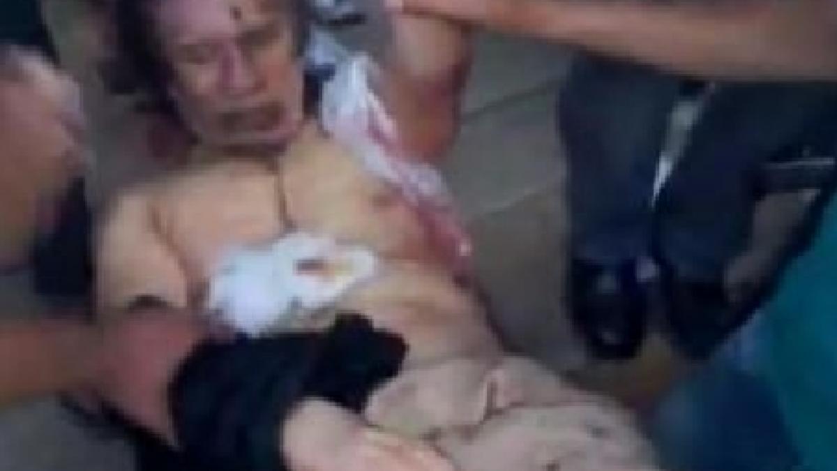 video terifiant cum au batjocorit rebelii trupul neinsufletit al lui gaddafi