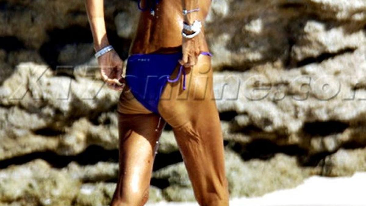 imaginea dureroasa de pe plaja cu regina unui imperiu se poate imbraca in bani dar nu poate