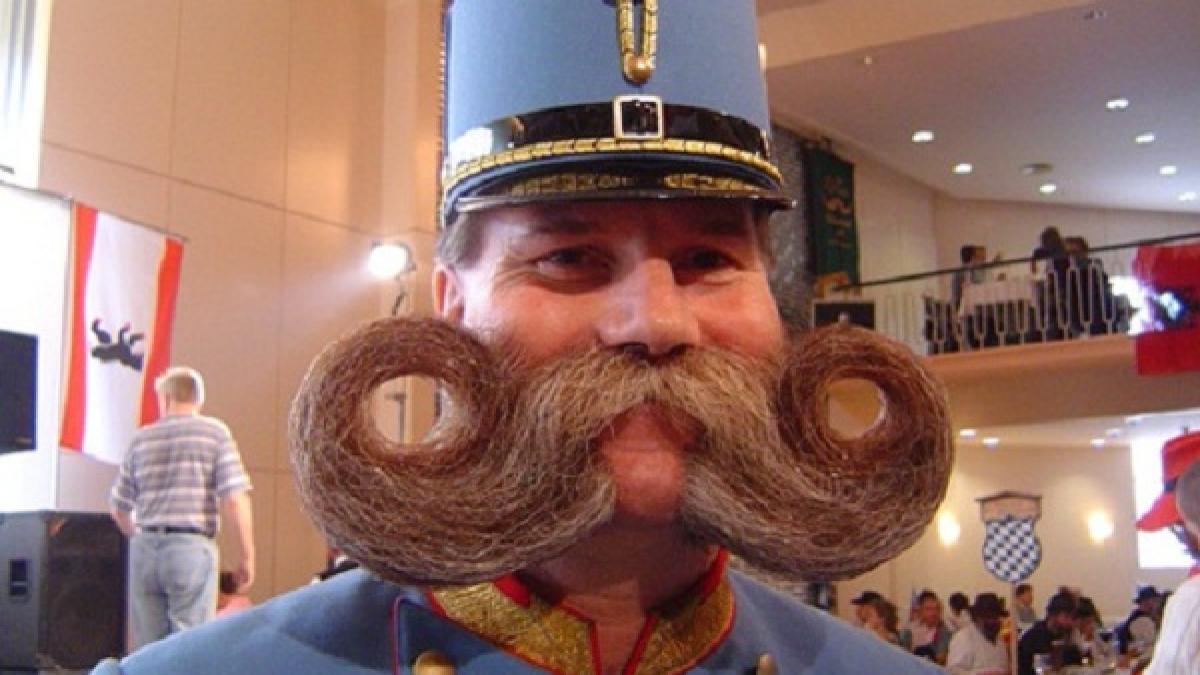 cercetatorii au dovedit posesorii de mustata sunt mai feriti de cancerul de piele