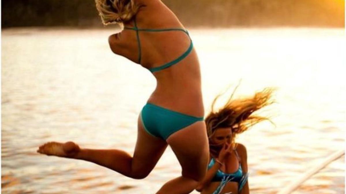 o blonda puternica a revenit la surf dupa ce a fost aproape devorata de rechini