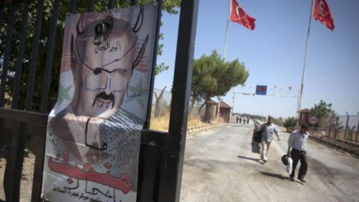 alungati de violentele regimului al assad mii de sirieni se refugiaza zilnic in turcia