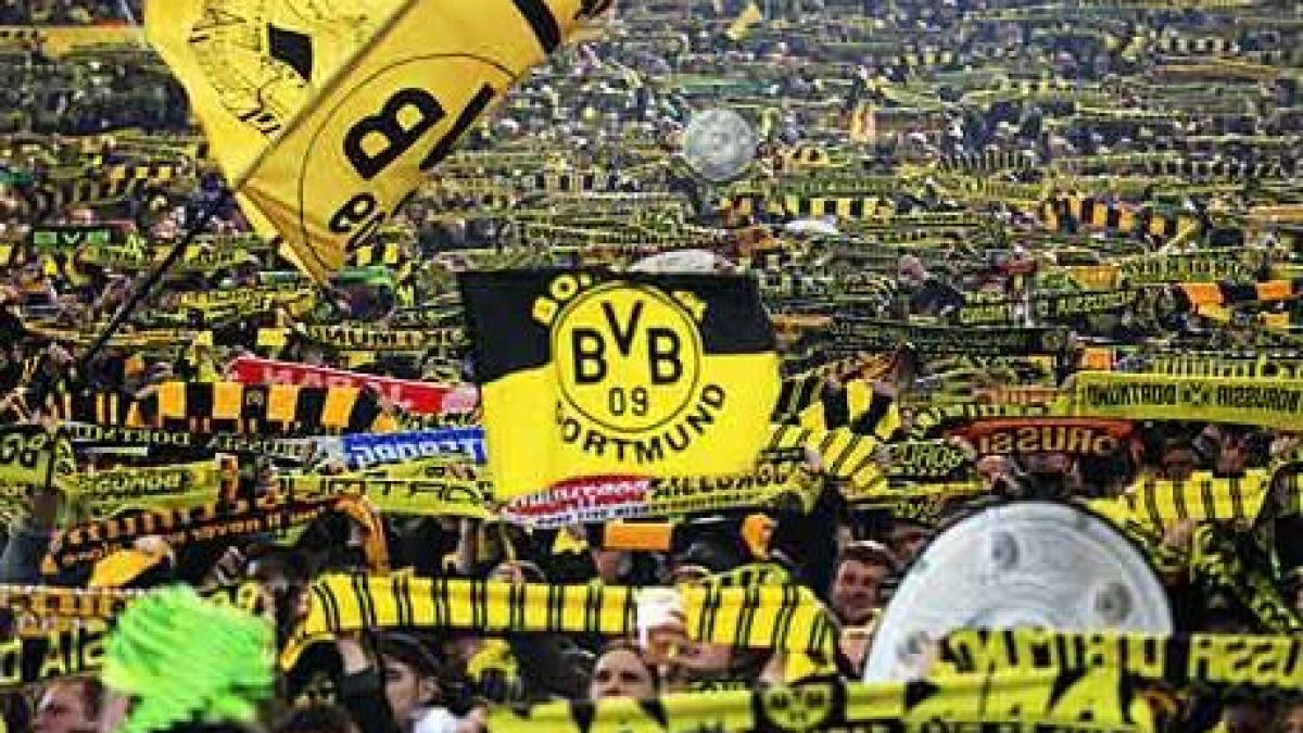 biserica interzice piatra funerara a unui copil pictata in culorile borussiei dortmund