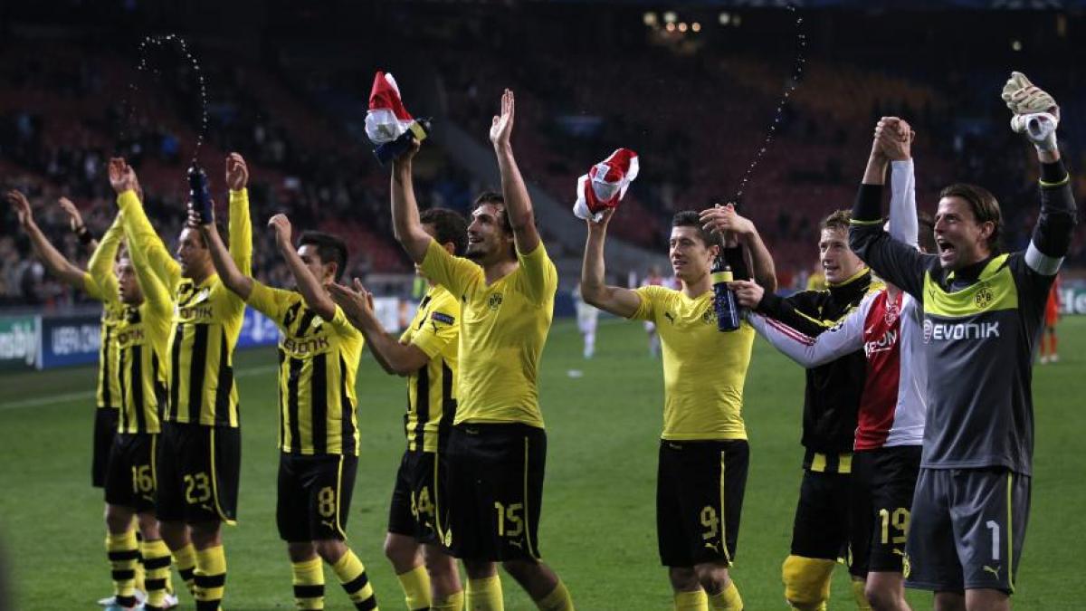 liga campionilor real madrid si ac milan se califica in optimi dortmund castiga grupa mortii