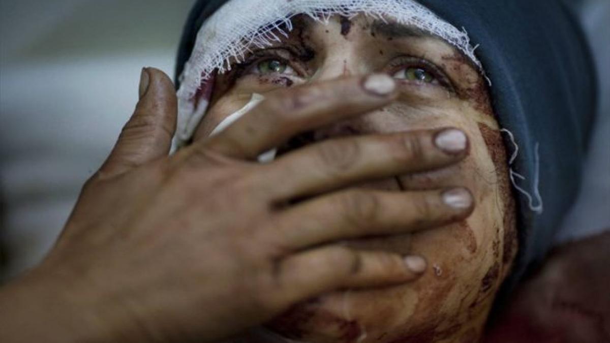 cele mai bune fotografii de breaking news premiate la pulitzer 2013