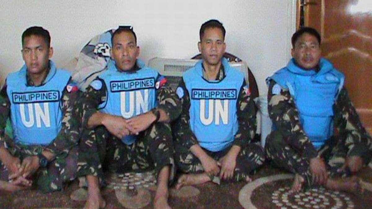 filipine isi va retrage fortele de mentinere a pacii din inaltimile golan