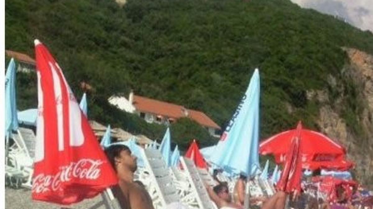 cand mi am dat seama ca i o face chiar langa noi pe plaja am plecat imediat fotografia de vacanta