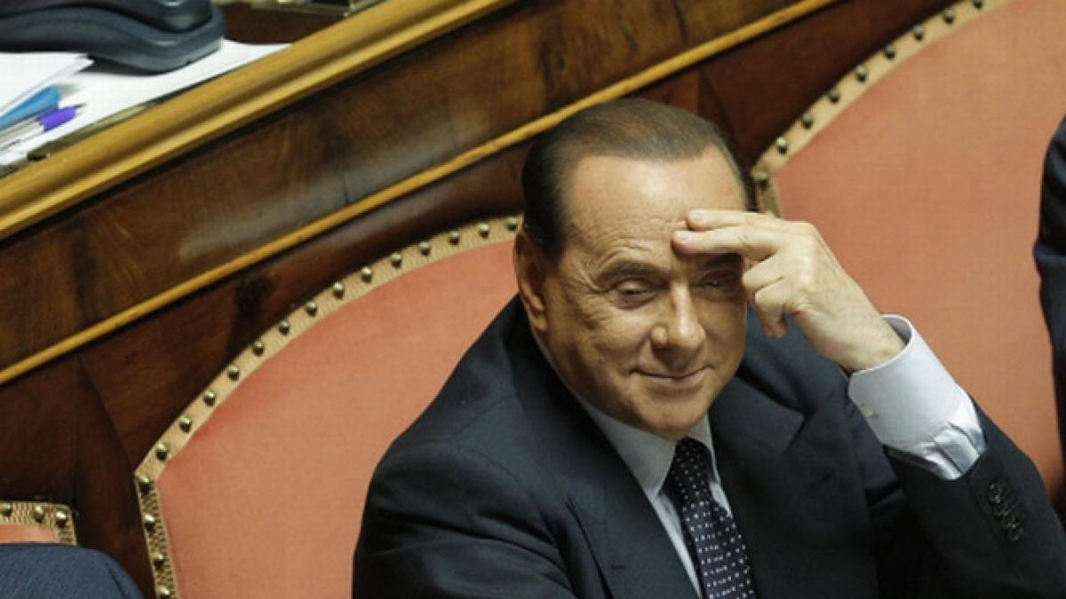 italia aproape de caderea guvernului partenerii de coalitie ai lui berlusconi cer demisia fostului