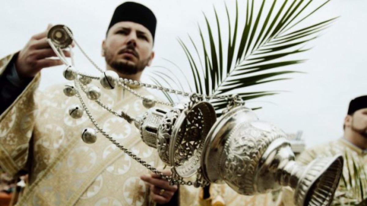 un preot din iasi acuzat ca si a amenintat sotia cu moartea