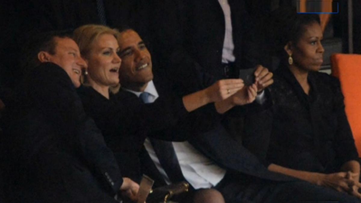 obama surprins razand alaturi de premierul danemarcei la omagierea lui mandela