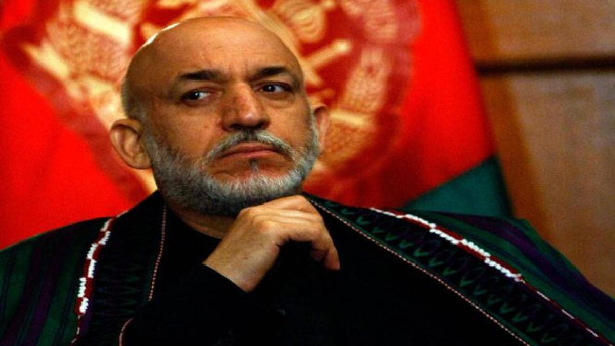 presedintele afgan negociaza in secret cu talibanii