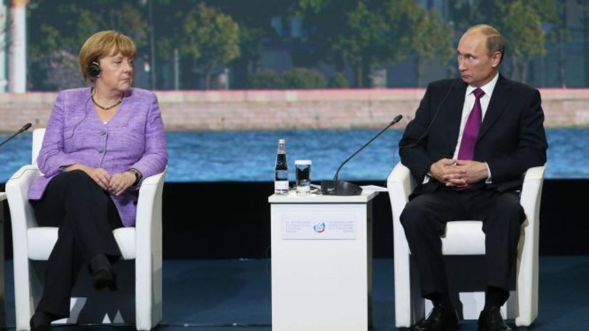 angela merkel si vladimir putin au discutat despre situatia din ucraina integritatea teritoriala