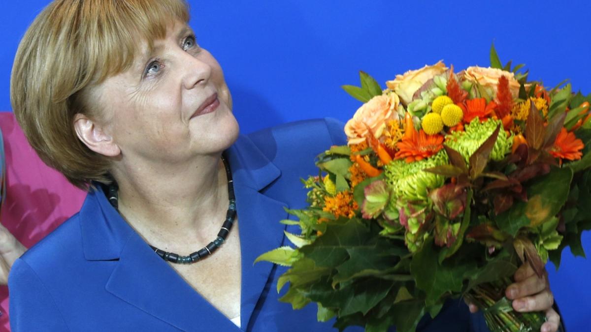 surpriza la summitul de la bruxelles pentru angela merkel a fost primita cu sampanie si flori
