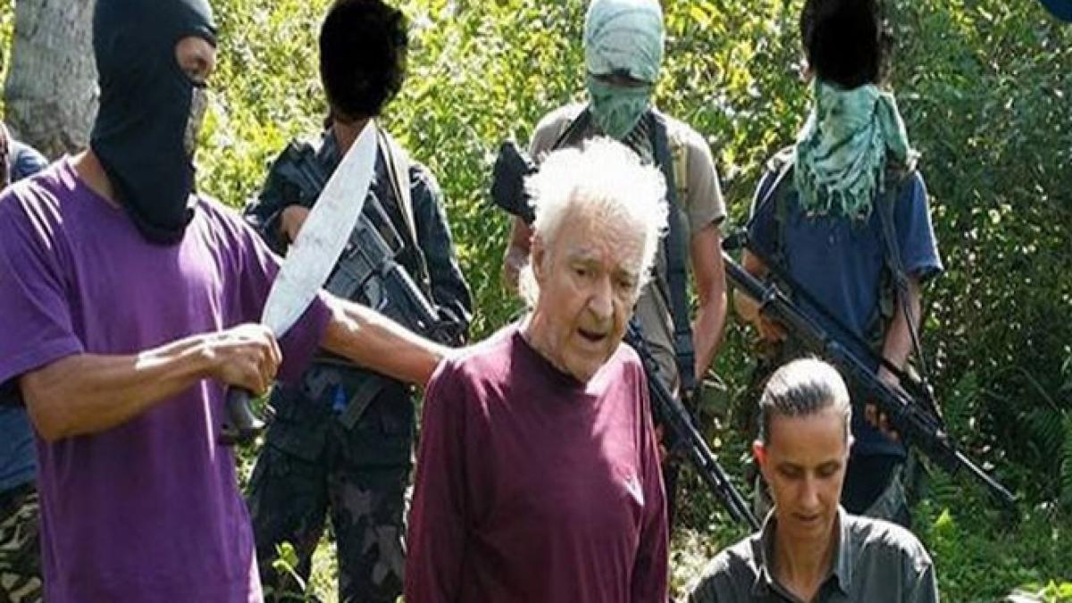 islamistii filipinezi ameninta ca vor decapita un ostatic german