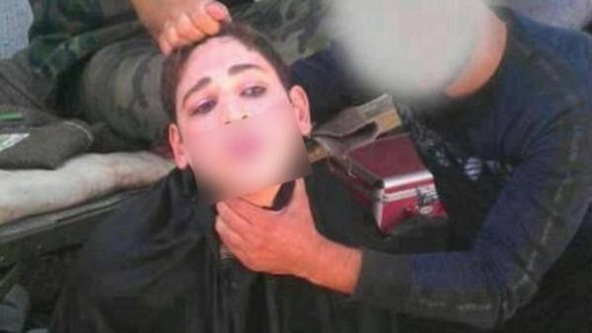 militantii si incearca sa scape deghizati in femei