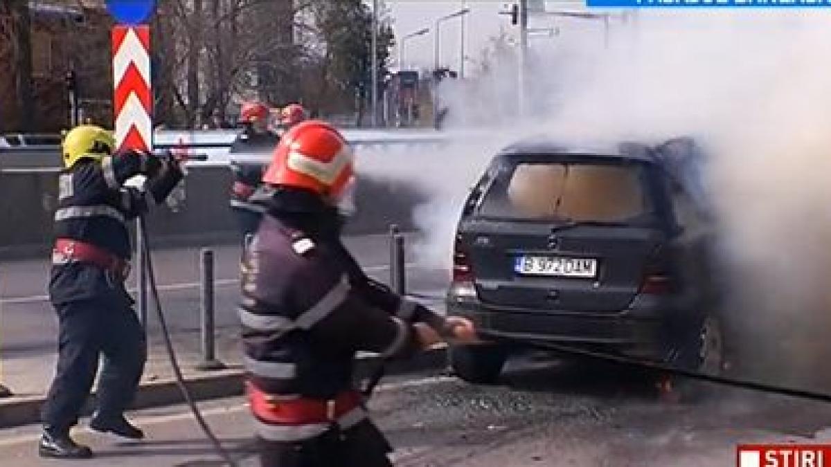 o masina a luat foc in pasajul baneasa
