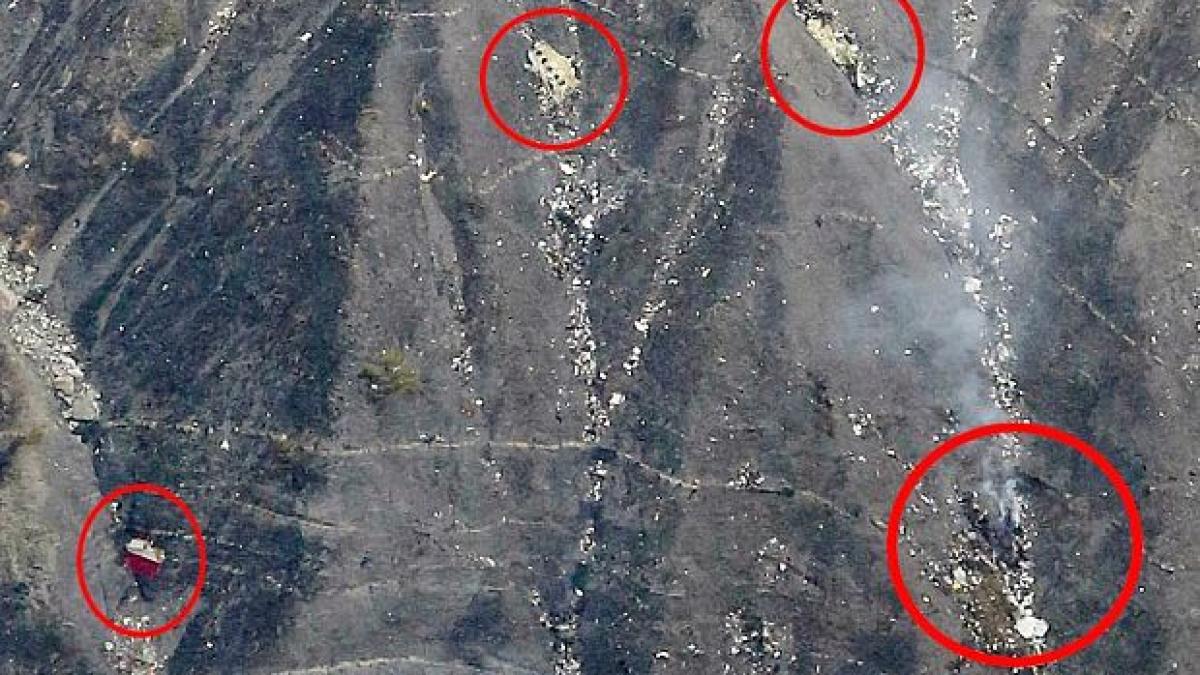 au aparut primele imagini cu operatiunile de cautare ale avionului prabusit in franta video