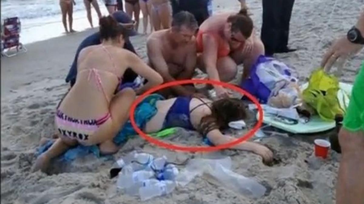 video copii fara maini in urma unor atacuri ale rechinilor pe o insula din carolina