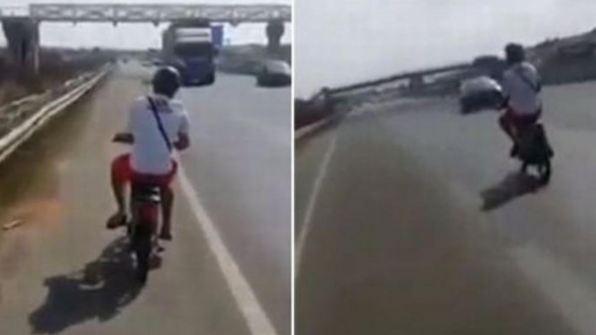 inconstienta maxima merg pe contrasens pe autostrada cu scuterul