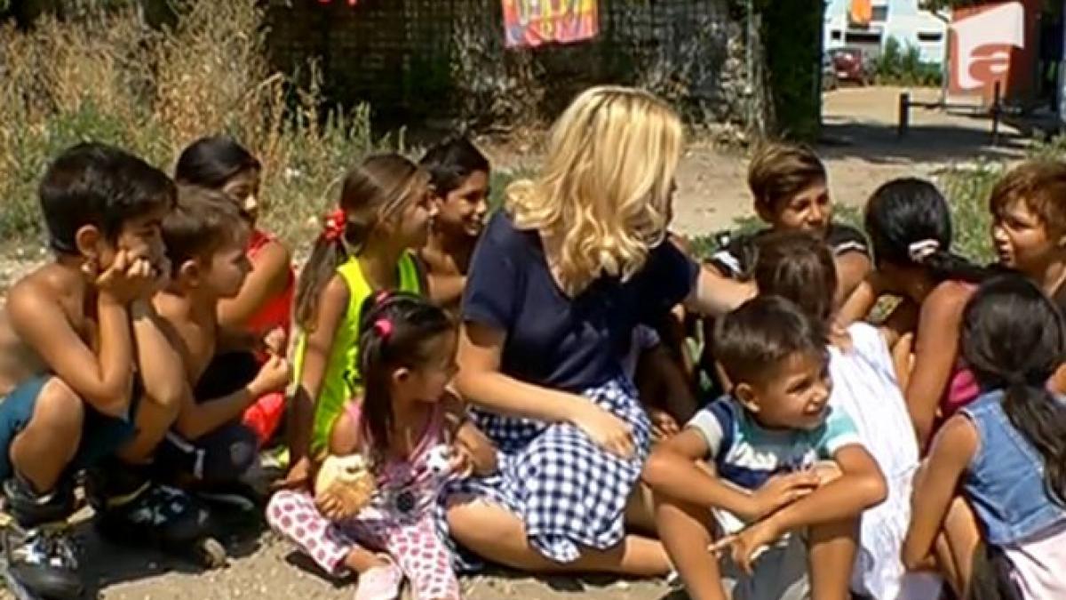 ghetoul de sub nasul alesilor printre sobolani si gunoaie copii premiati invata la lumina lumanarii